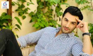 Arslan Asad Butt posing for a photoshoot, Pakistani actor and model known for his television dramas and modeling career.