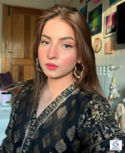 Pakistani actress Dananeer Mobeen reacts during a public event as her humorous Instagram post about a flat tire trends across social media.
