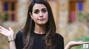 Iqra Aziz smiling during a photoshoot in 2026, showcasing the popular Pakistani actress known for her hit dramas, elegant style, and successful television career.