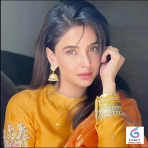 Saba Qamar posing elegantly in a stylish outfit during a professional photoshoot in 2026, showcasing the award-winning Pakistani actress and model.