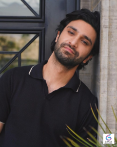 Ahad Raza Mir posing in a stylish outfit during a professional photoshoot in 2026.