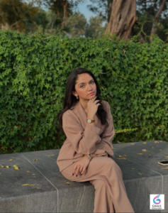 Aina Asif smiling during a photoshoot, showcasing the young Pakistani actress known for her hit television dramas and rising career in the entertainment industry.