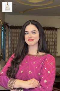 Alina Amir posing confidently in a stylish outfit during a professional photoshoot.