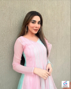 Eshal Fayyaz posing gracefully in a stylish traditional outfit during a professional photoshoot, showcasing her elegant personality and growing career in the Pakistani entertainment industry.