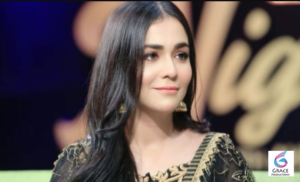 Humaima Malick smiling during a professional photoshoot, showcasing the acclaimed Pakistani actress and model known for Bol and her successful entertainment career.