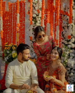 Laiba Khan and Jawad Ali styled together in a wedding-themed photoshoot scene
