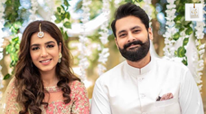 Pakistani Actress Mansha Pasha smiling in an elegant traditional outfit