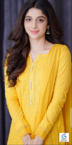 Marwa Hussain posing gracefully in a stylish traditional outfit during a professional photoshoot, showcasing her elegant personality and natural charm.