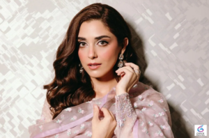 Maya Ali posing confidently for a fashion and entertainment photoshoot.
