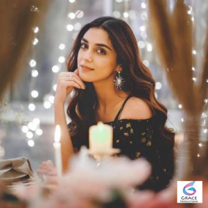 Maya Ali posing elegantly in a stylish outfit during a professional photoshoot in 2026.
