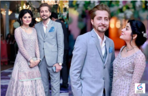 Sanam Baloch smiling during a public appearance, highlighting her successful career as a Pakistani actress and television host.