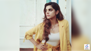 Sanam Saeed posing in a stylish outfit during a professional photoshoot, showcasing her elegant personality and timeless fashion sense.