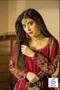 Urwa Hocane smiling in a glamorous portrait highlighting the Pakistani actress, model, and producer in 2026.