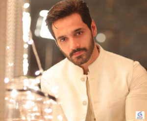 Wahaj Ali smiling during a photoshoot in 2026, showcasing the popular Pakistani actor known for hit drama serials and his successful television career.