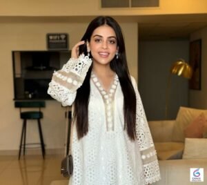 Yashma Gill smiling during a professional photoshoot in a stylish traditional outfit