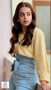 Yashma Gill posing gracefully in a fashionable outfit during a professional portrait session