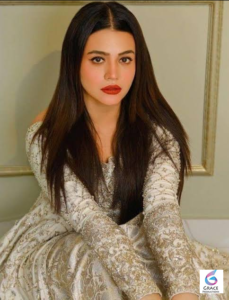 Pakistani television actress Zara Noor Abbas posing with a confident smile in a beautifully designed traditional outfit.