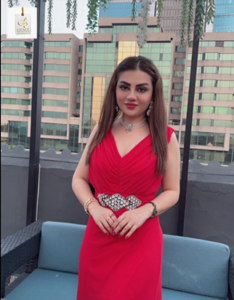 Rida Isfahani smiling during a public appearance with a graceful style