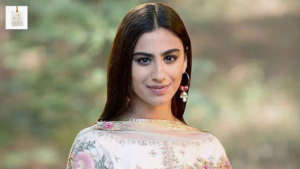Rehmat Ajmal posing gracefully during a professional photoshoot, showcasing her elegant style and growing presence in the Pakistani television and fashion industry.