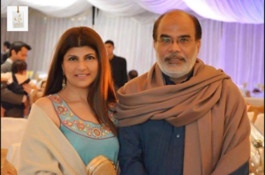 Rubina Ashraf smiling in a stylish look at a public appearance